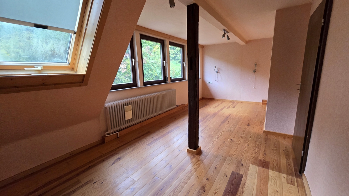 Schlafzimmer 1 mit Echtholzboden